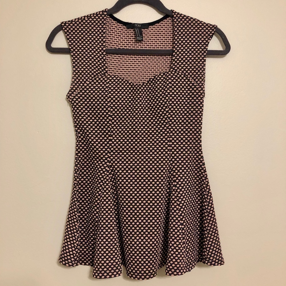 Pink and black peplum top